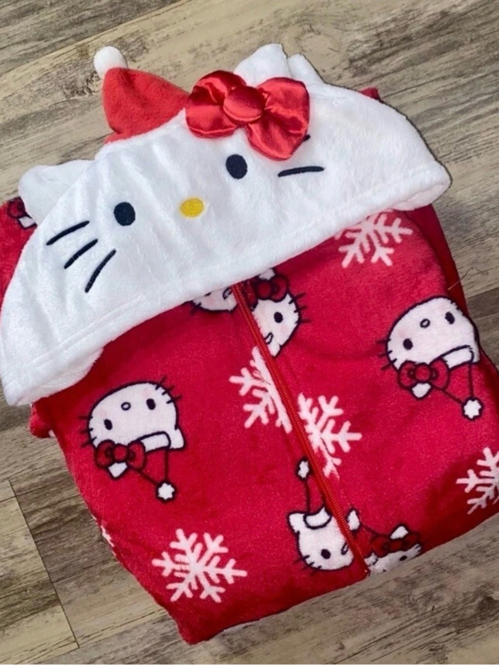 Hello Kitty Red Hooded women’s open footed onsie with Bow
